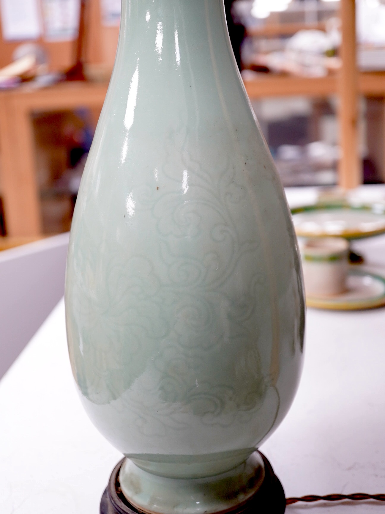 A Chinese celadon glazed vase table lamp on stand, 37cm high. Condition - good